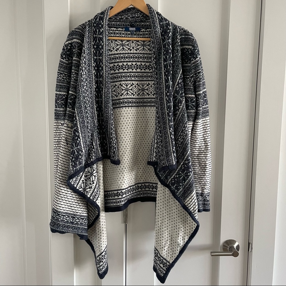 Thick knit cardigan sweater with snowflake detail and waterfall hem